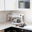 Ascaso Steel Duo V2.5 PID Dual Thermoblock Espresso Machine in white, on a marble kitchen counter with cups and a tamper