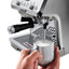 De'Longhi La Specialista Arte Evo Espresso Machine with Cold Brew in metal, steaming milk with the manual wand