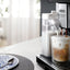 De'Longhi LatteCrema Cool Upgrade Set for Rivelia, cold foam dispensing into a glass