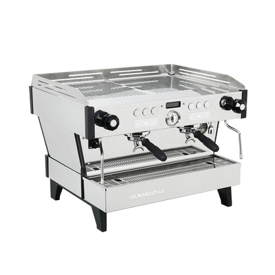 La Marzocco Linea PBX two group commercial espresso machine, angled view showing the group heads and steam wands