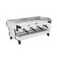 La Marzocco Linea PBX four group commercial espresso machine, angled view showing the group heads and steam wands