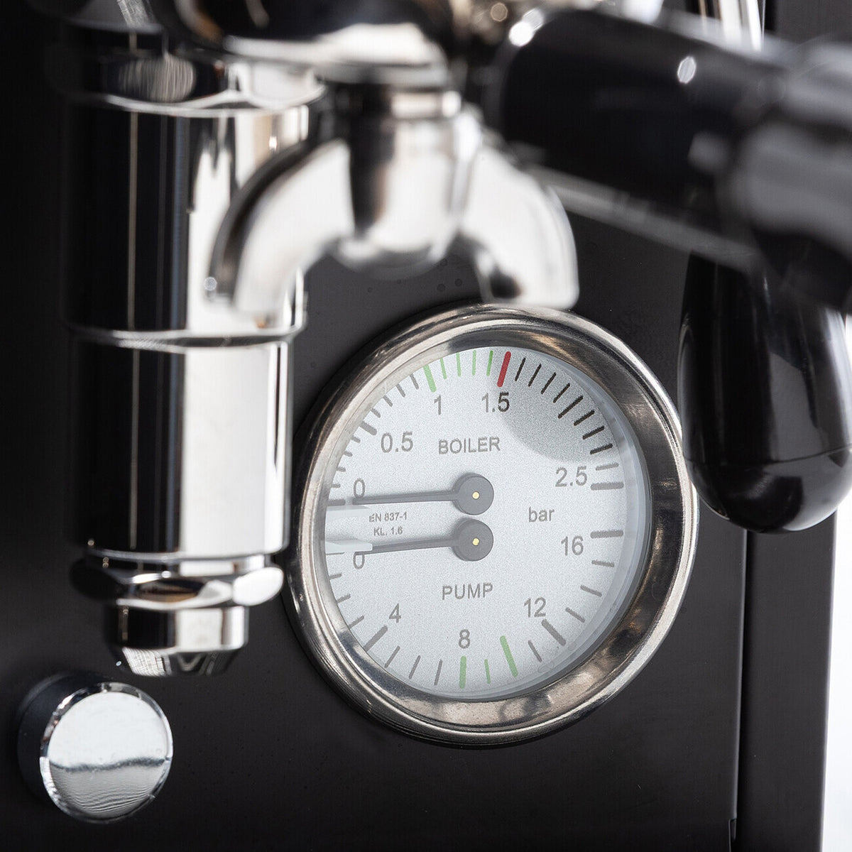 Close-up of the La Pavoni Mini Cellini X dual-scale boiler and pump pressure gauge