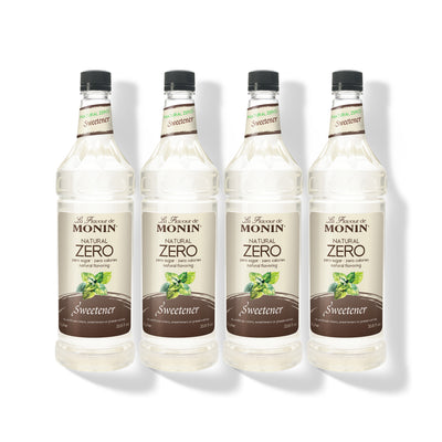 Four 1L plastic bottles of Monin Natural Zero Sweetener in a row