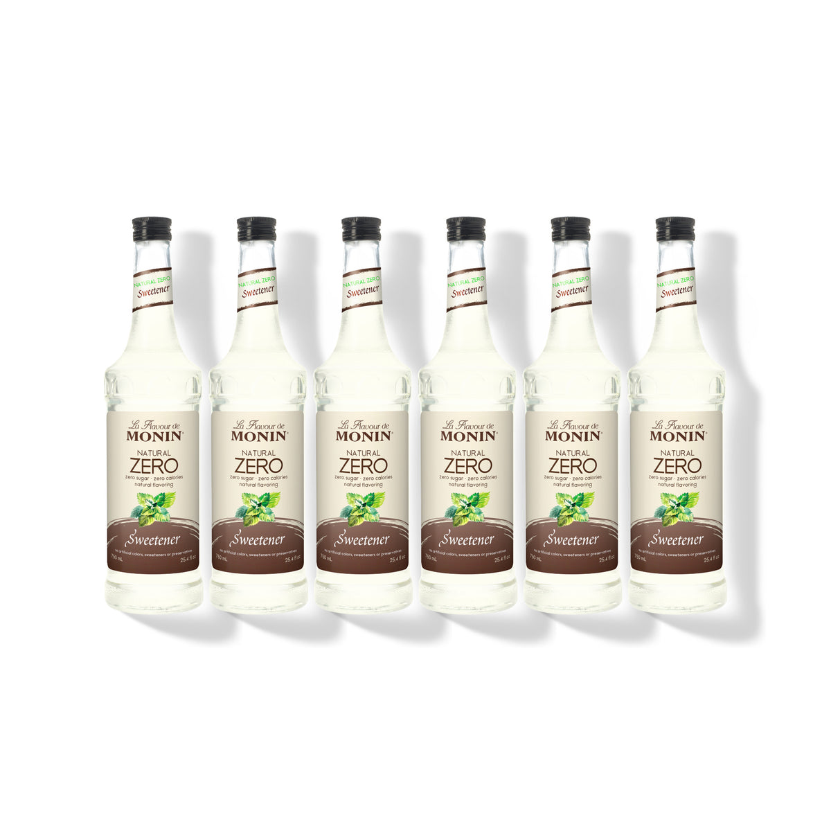 Six 750ml glass bottles of Monin Natural Zero Sweetener in a row