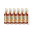 Six 750ml glass bottles of Monin Organic Caramel syrup in a row