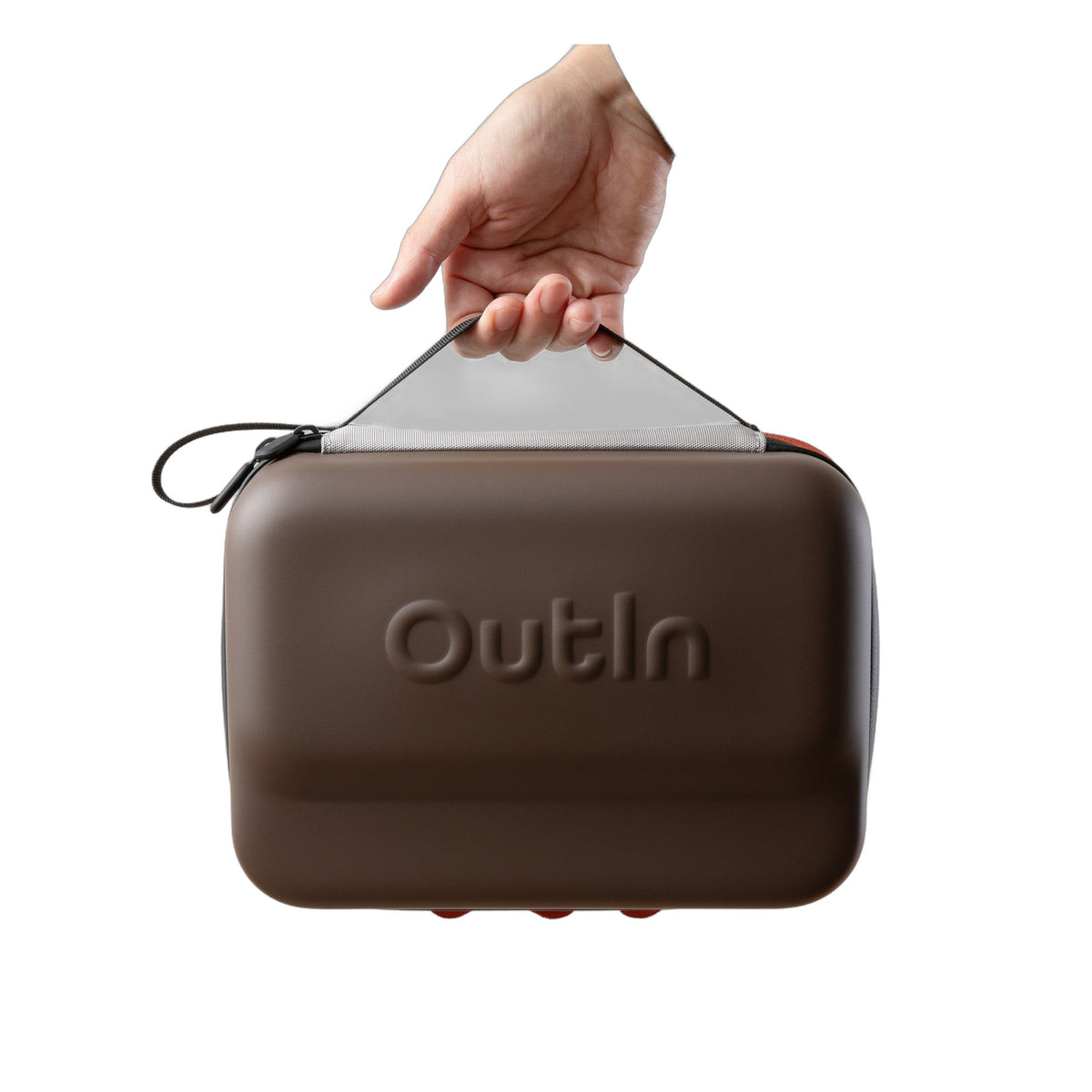 OutIn EVA Protective Case Plus in maple brown, held by the carry handle