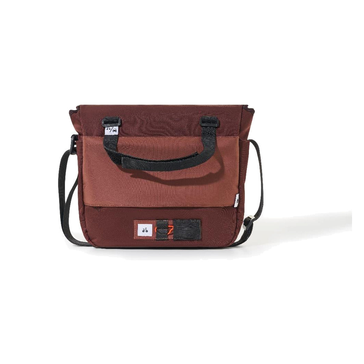OutIn Flex Messenger Bag in amber brown, three-quarter view with the shoulder strap