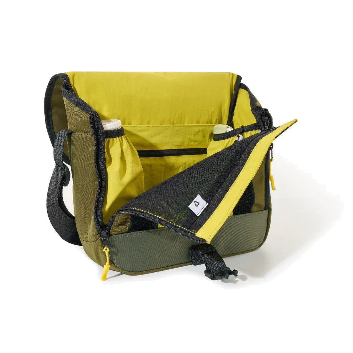 OutIn Flex Messenger Bag in cypress green, open, showing the padded interior