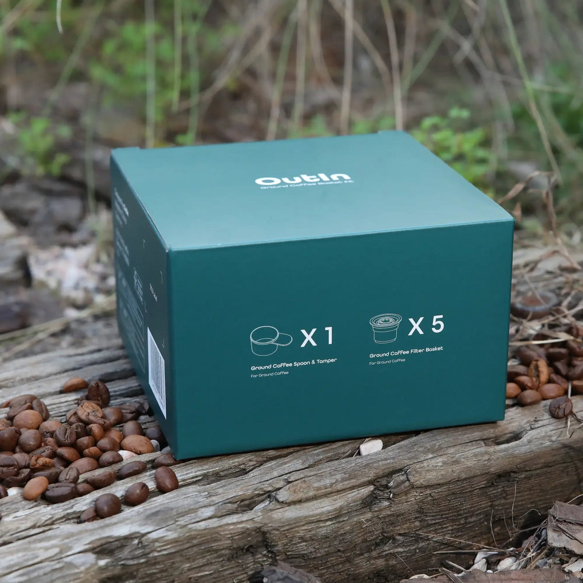 OutIn Nano Filter Baskets Kit 5-in-1, packed outdoors among coffee beans