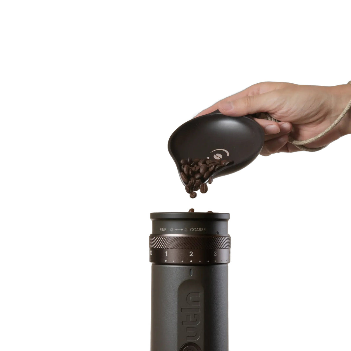 OutIn Rebrew Bean Tray, pouring beans into a grinder