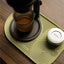 OutIn Silicone Coffee Mat, in use during a pour