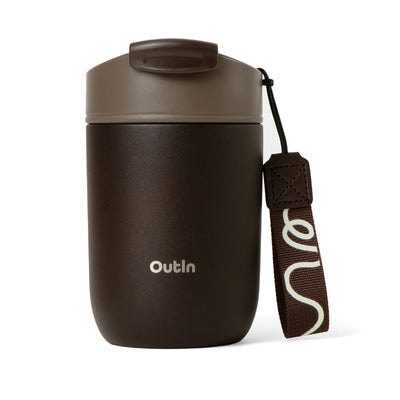 OutIn Travel Tumbler in terra brown, with the carry strap attached