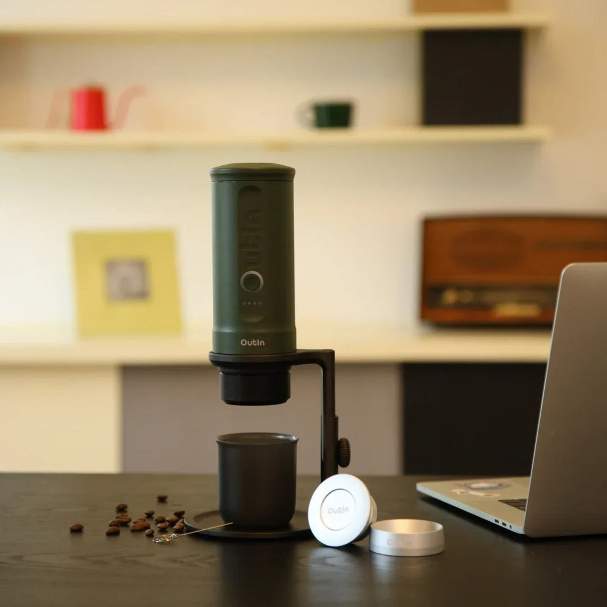 OutIn Universal Coffee Stand, set up on a desk