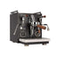 Profitec RIDE dual boiler espresso machine in matte black with walnut portafilter, three-quarter view