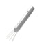 Subminimal Flick WDT tool in silver, angled with its needles extended